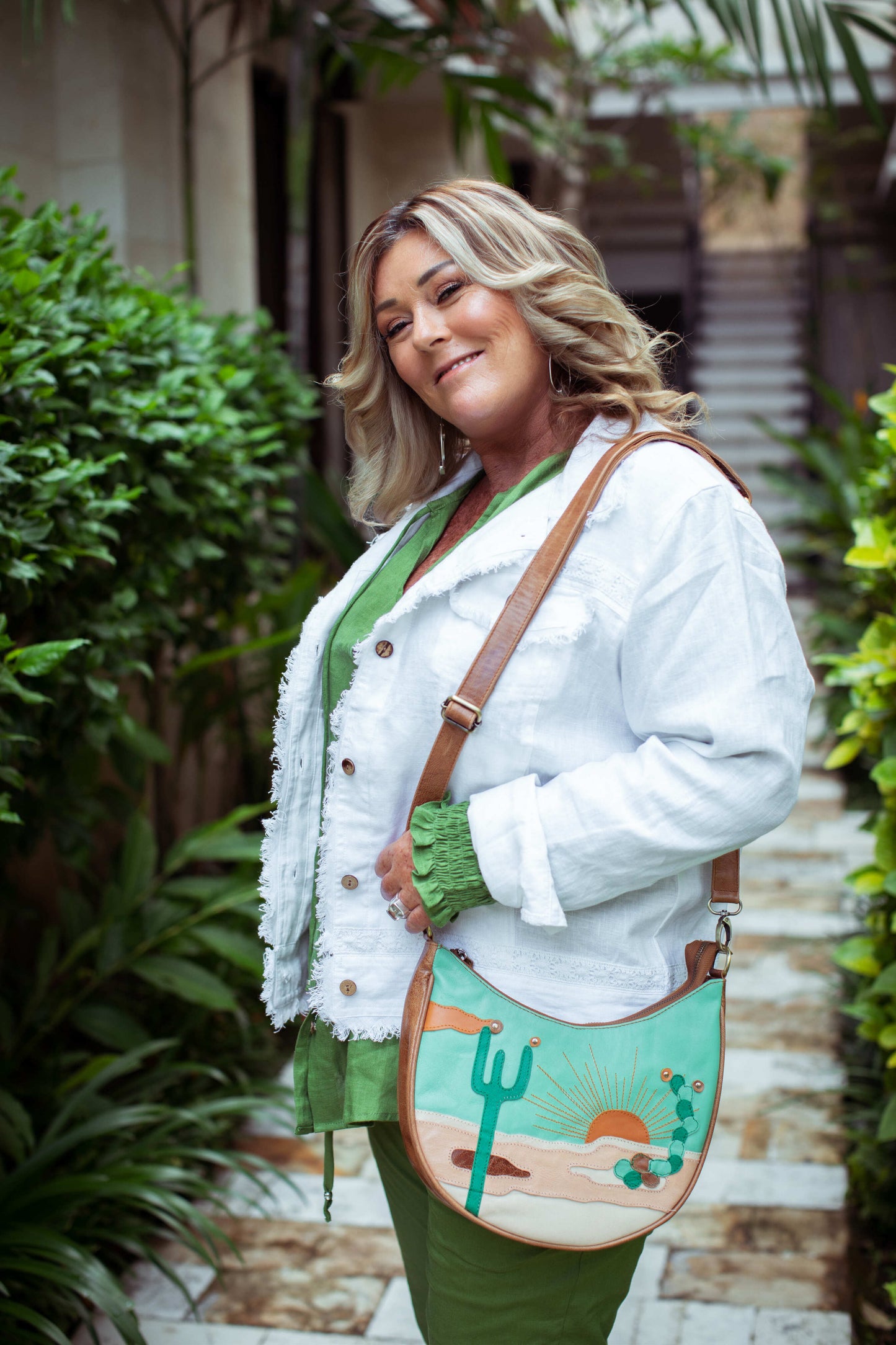 wearing cactus cross body bag